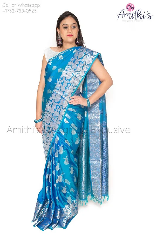 Blue Soft Silk Instrumental Design Saree With Silver Blouse